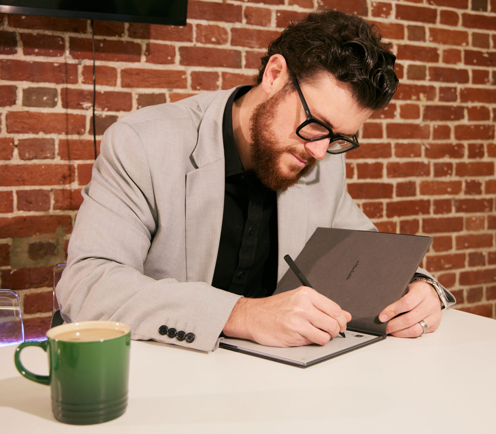 Josh Halsey MD of Chatsworth Mortgage Group Making Notes - First Time Buyers Mortgage Advice